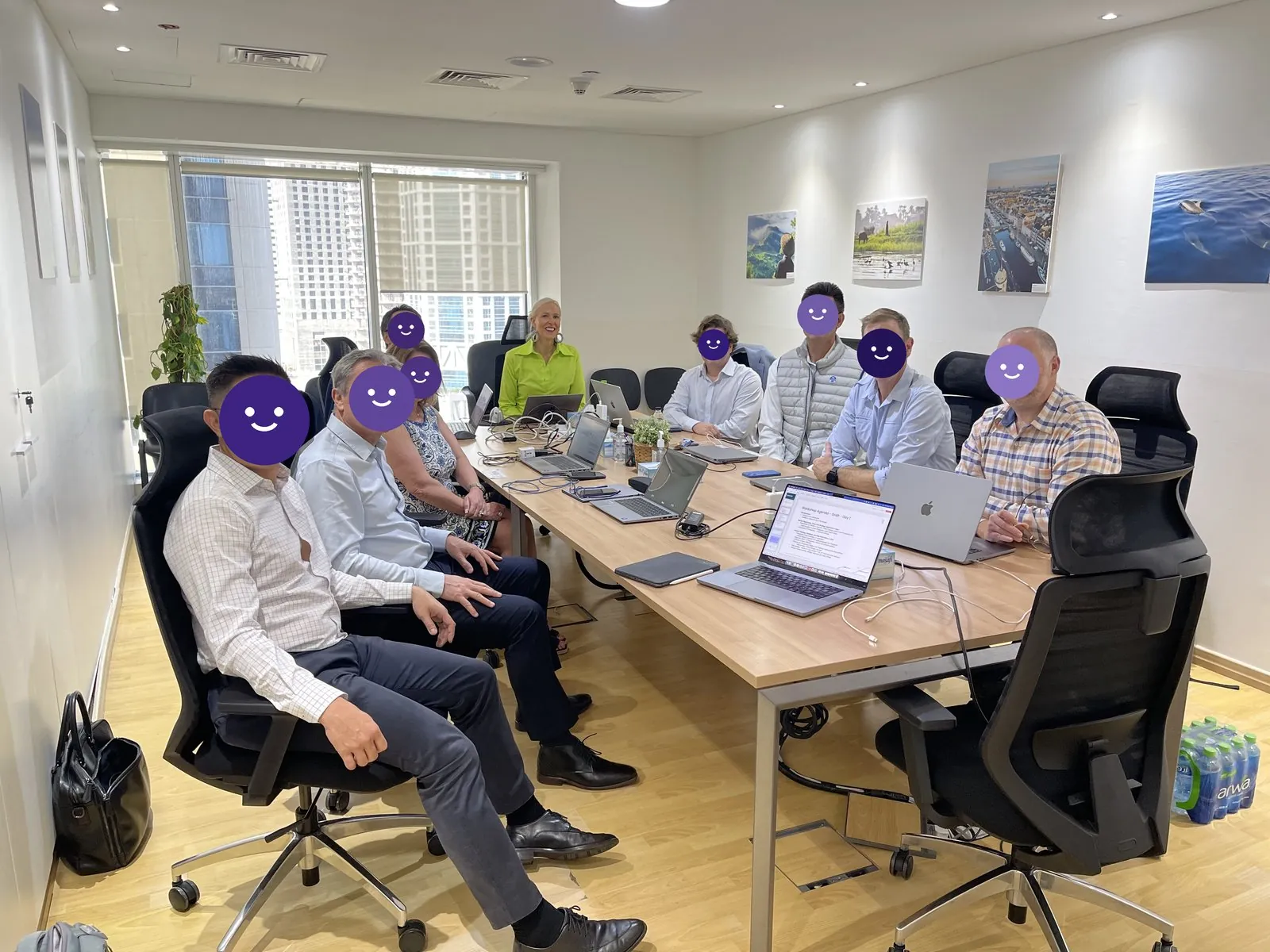 Kirsten Mann in a boardroom session — visible amongst the wider group