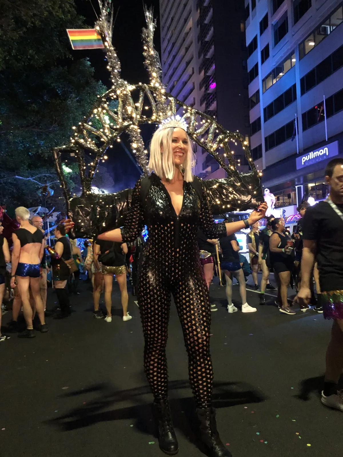 Kirsten in an illuminated Mardi Gras costume