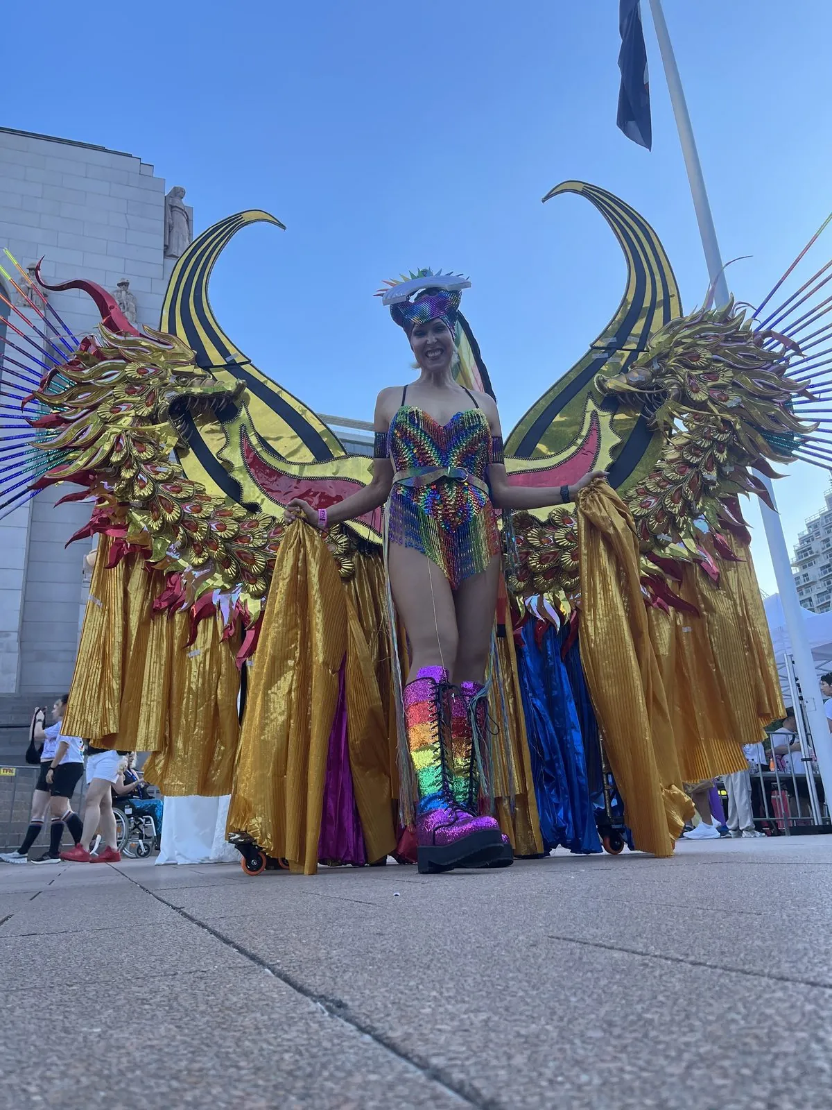 Kirsten in a winged Mardi Gras costume